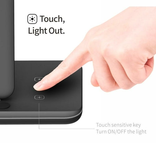 Hand touching a touch-sensitive key on a device with text indicating light control.