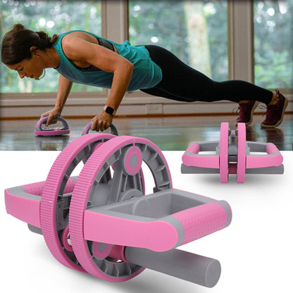 Woman exercising with pink and gray ab roller in a home setting