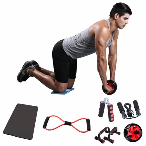 Man exercising with fitness equipment including a mat, resistance bands, and ab wheel on a white background.
