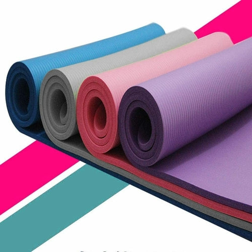 Set of colorful yoga mats on a geometric patterned background