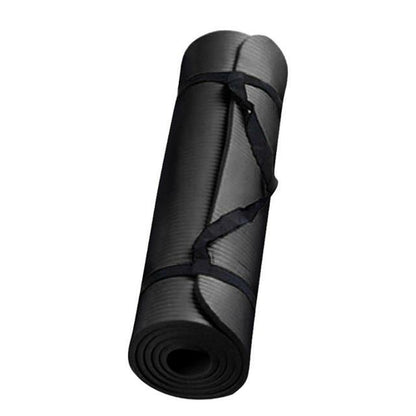 Black yoga mat with a carrying strap on a white background