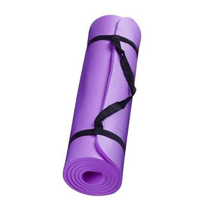 Purple yoga mat with a black strap on a white background