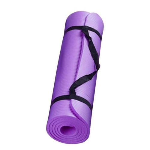 Purple yoga mat with a black strap on a white background
